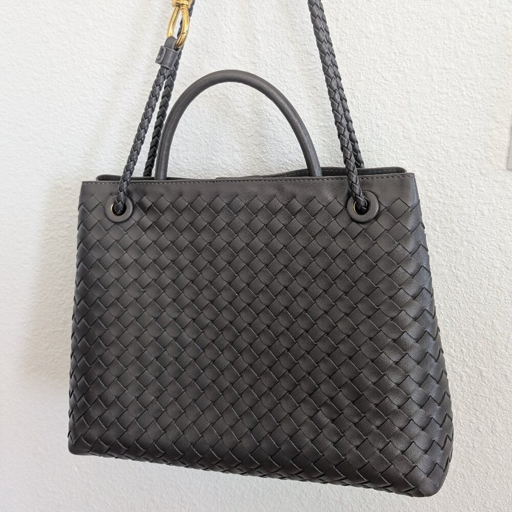 Iron gray color andiamo style faux leather woven purse